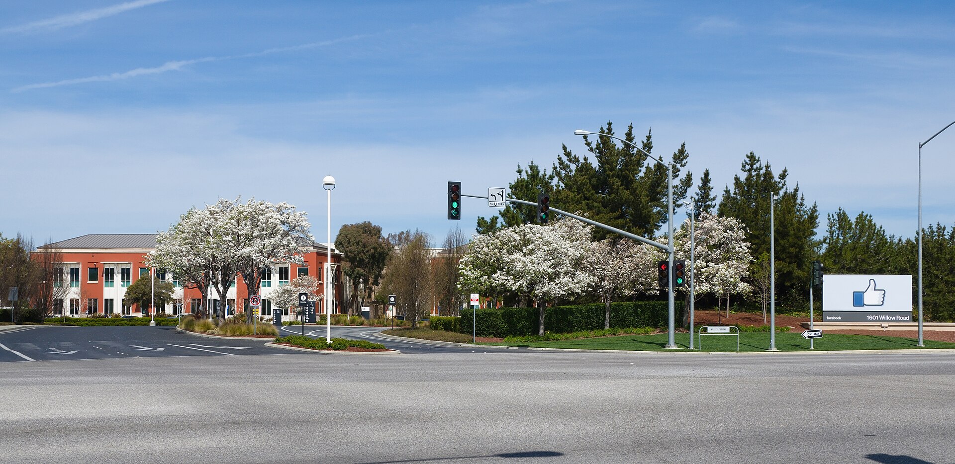 The entrance sign to Facebook's headquarters in Menlo Park, California, with the thumbs-up Like symbol